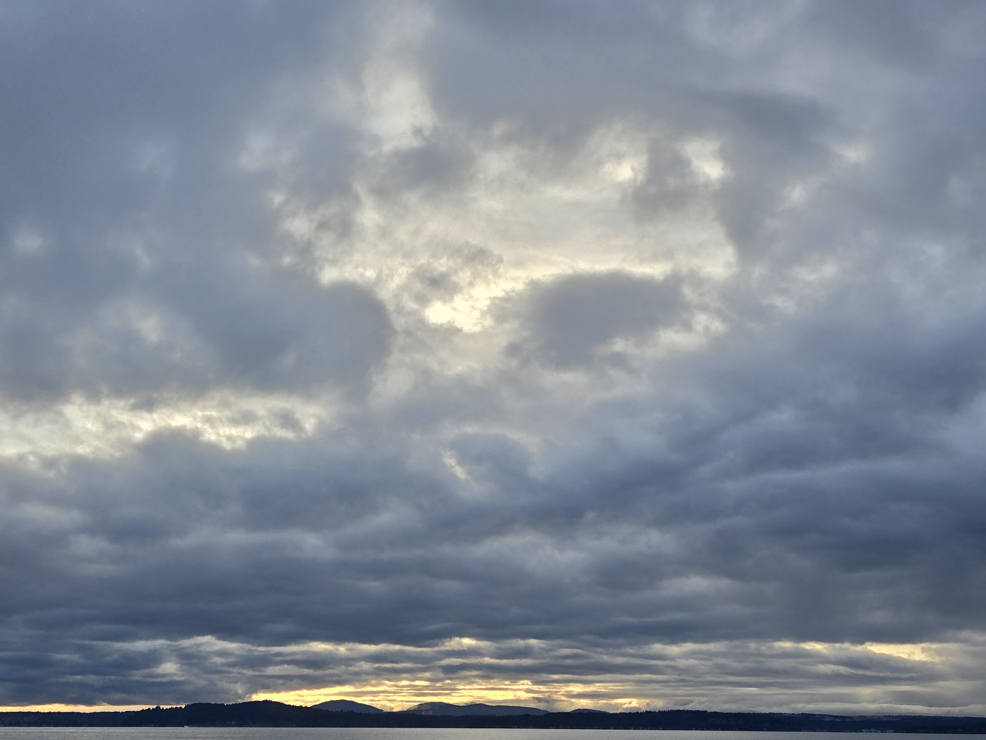 A background image for the website. It is a photograph of a harbor with islands in the near-ish distance.